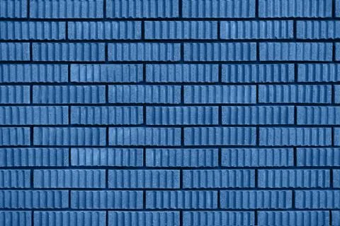 Brick wall texture. Background with copy space for design. Trendy blue and calm Stock Photos