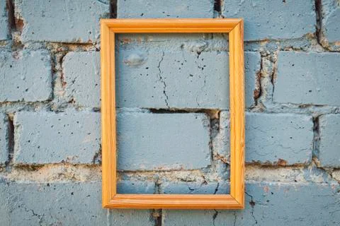 Brick wall texture background with picture frame. Stock Photos