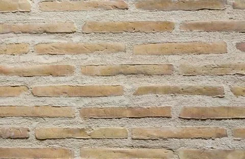 Brick wall texture, the bricks are thin and long Stock Photos