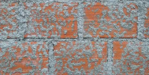 Brick wall texture with cement splashes, cerezitar Stock Photos