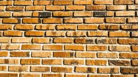 Brick Wall Texture Exposed by Sunlight Stock Photos