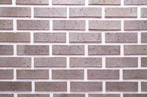 Brick wall, texture of gray stone blocks closeup Stock Photos