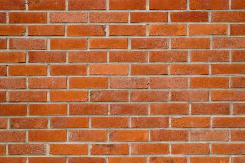 Brick wall texture with orange bricks Stock Photos