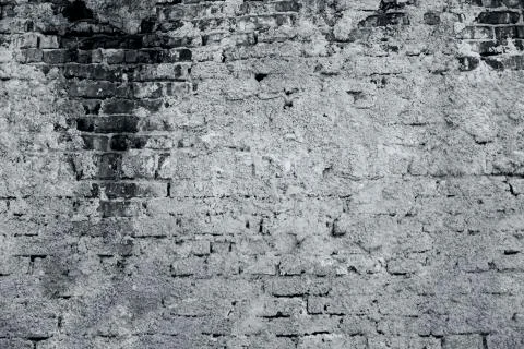 Brick wall texture partially plastered Stock Photos