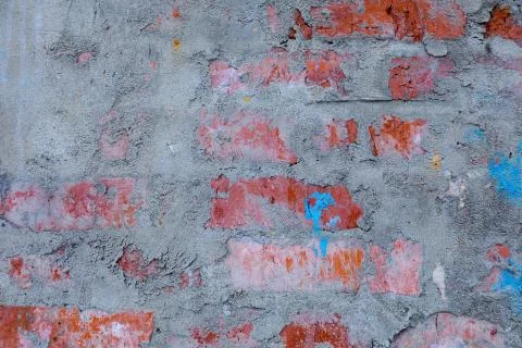 Brick wall texture partially plastered Stock Photos