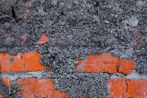 Brick wall texture partially plastered Stock Photos