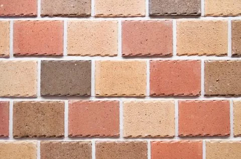 Brick wall, texture of red stone blocks closeup Stock Photos
