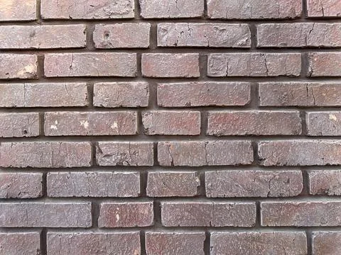 Brick Wall Texture Showcasing Warm Tones and Rustic Charm in a Close-Up View Stock-Fotos