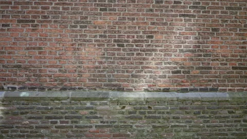 Brick wall texture showing weathered surface with visible uneven bricks and.. Stock Footage 312867287