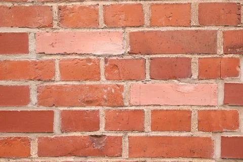 Brick wall with two stones of different color Stock Photos