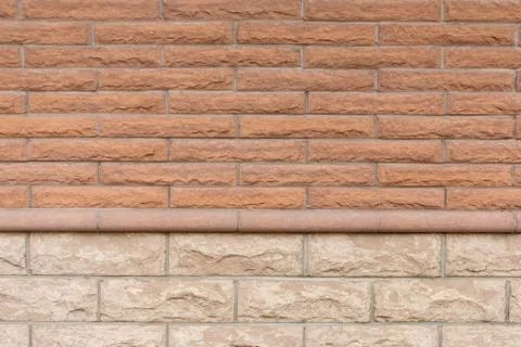 Brick wall with two types of bricks. Stock Photos