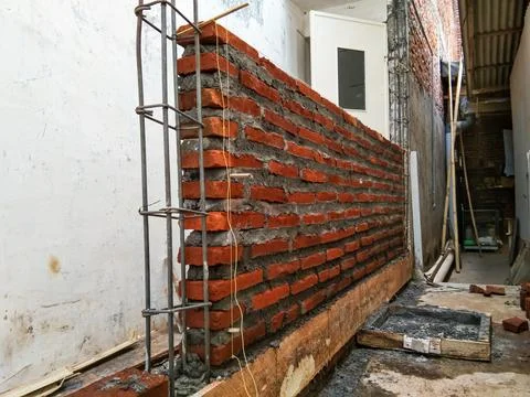Brick wall under construction Stock Photos