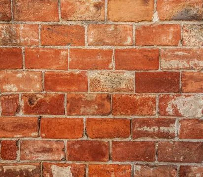 Brick wall, unusually built on the surface Stock Photos