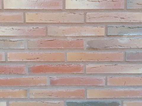 Brick wall viewed close with background texture Stock Photos
