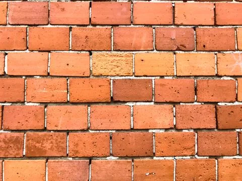A brick wall with a white border Foto stock