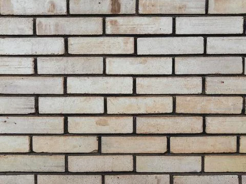 A brick wall with a white brick pattern 스톡 사진