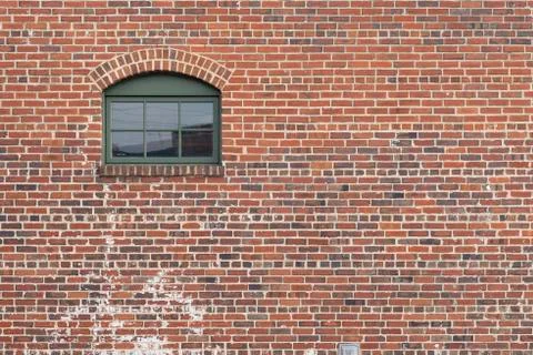 Brick wall with window door Stock Photos