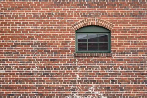 Brick wall with window door Stock Photos