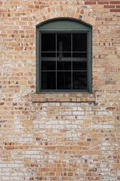 Brick wall with window door Stock Photos