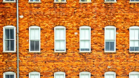 Brick wall of windows Stock Footage 265991346