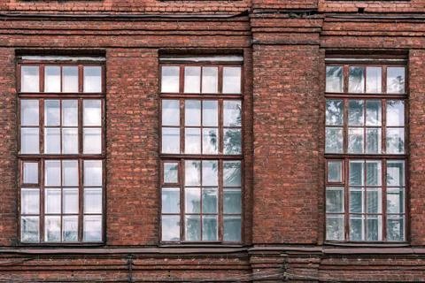 Brick wall with windows. Stock Photos