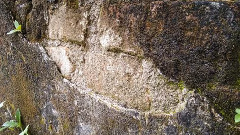 A brick wall with the word'embossed'on it Stock Photos