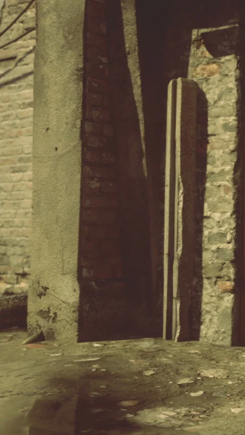 Brick walls create shadow patterns in an old alley during sunset in a city Stock Footage 334175581