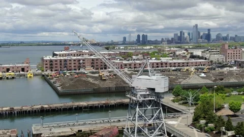 Brick Warehouse and Harbor Crane on the Red Hook Waterfront Stock Footage 154008424