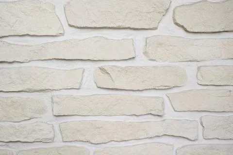 Brick-like white cobblestone irregular Stock Photos