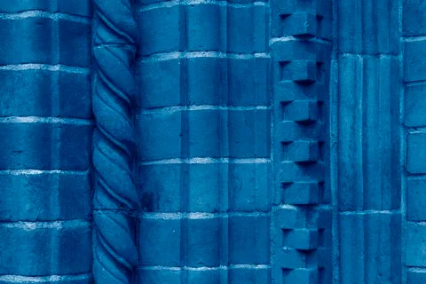 Brick work wall with ornament on old building. Dark blue brick wall texture Fotos de archivo