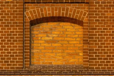 Bricked window of the old mill building Stock Photos