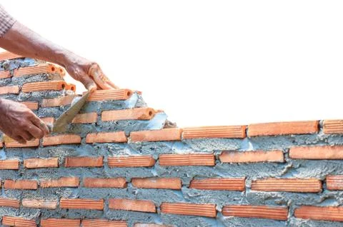 Bricklayer  builder wall isolated on white Stock Photos