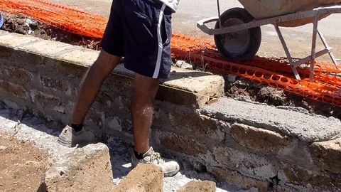 Bricklayer building a wall Stock Footage 97175884