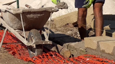 Bricklayer building a wall Stock Footage 97176653
