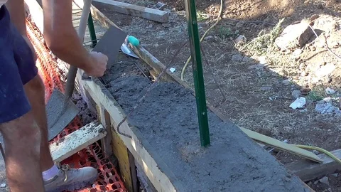 Bricklayer building a wall Stock Footage 97176901