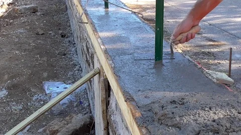 Bricklayer building a wall Stock Footage 97177166