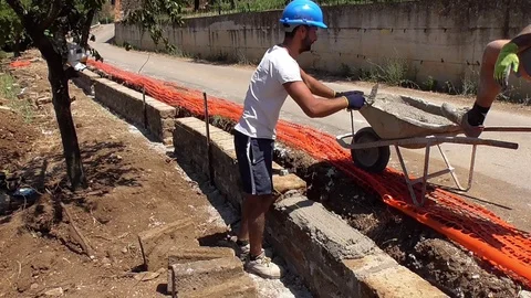 Bricklayer building a wall Stock Footage 97177340
