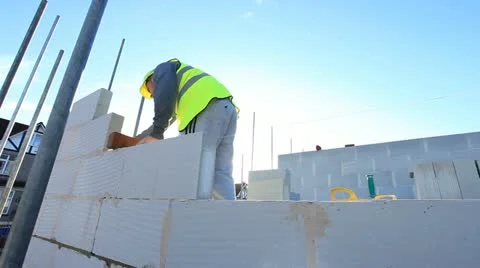 Bricklayer on construction site Stock Footage 12150532