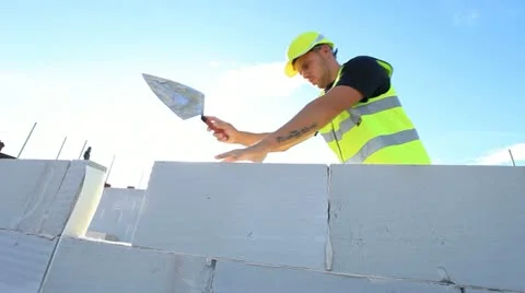 Bricklayer on construction site Video stock 12150658