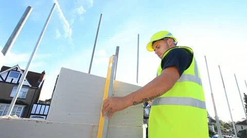 Bricklayer on construction site Stock Footage 12150730