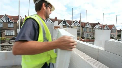 Bricklayer on construction site Stock Footage 12154993