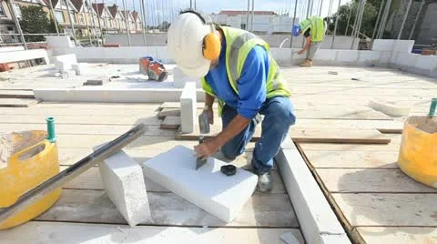 Bricklayer on construction site Stock Footage 12178624