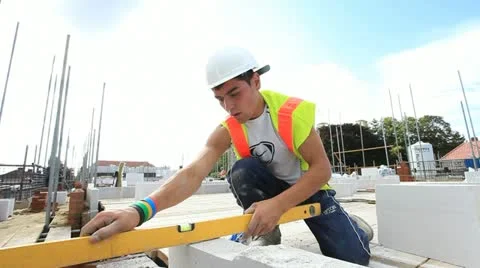 Bricklayer on construction site Stock Footage 12181023