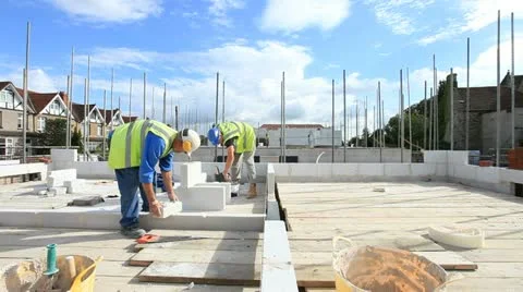 Bricklayer on construction site Stock Footage 12184054