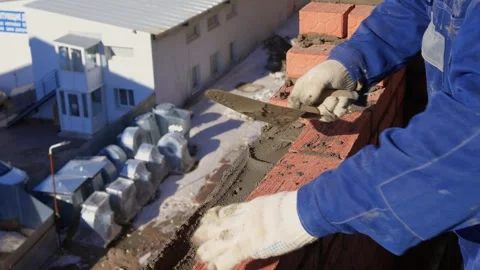 Bricklayer Hard at Work Ongoing Construction of a Residential Building Structure Stock Footage 305850311