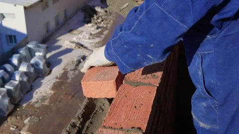 Bricklayer Hard at Work Ongoing Construction of a Residential Building Structure Stock Footage 305850392