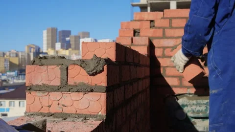 Bricklayer Hard at Work Ongoing Construction of a Residential Building Structure Stock Footage 305850773