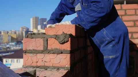 Bricklayer Hard at Work Ongoing Construction of a Residential Building Structure Stock Footage 305850866