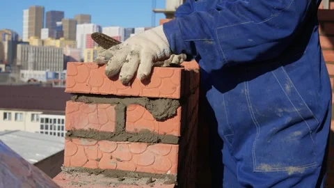 Bricklayer Hard at Work Ongoing Construction of a Residential Building Structure Stock Footage 305850956