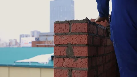 Bricklayer Hard at Work Ongoing Construction of a Residential Building Structure Stock Footage 305855944